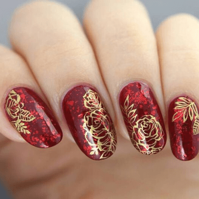 Red Nails With Golden Rose Touch