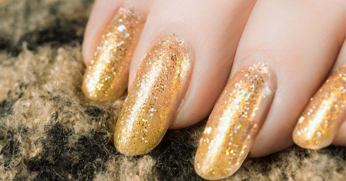 5. Elegant Gold and Black Nail Ideas - wide 6